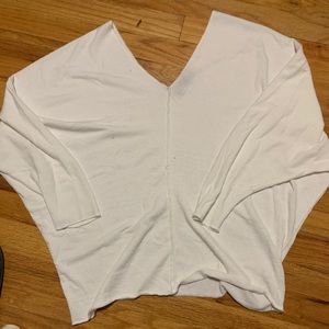 Cream double v neck oversized light sweater